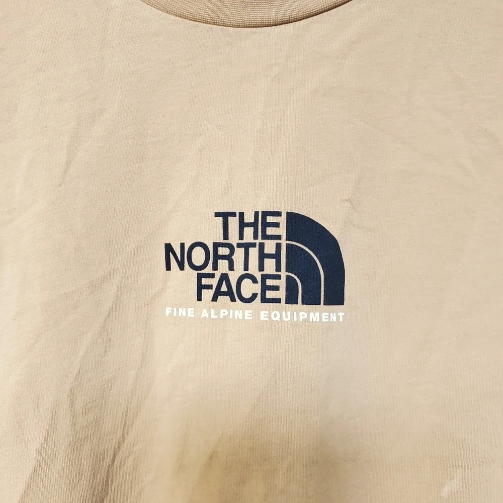 The North Face Men's Gold T-Shirt. Size Large